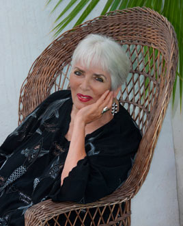 1.relaxed-pose-in-black-on-kristel-chair 1.relaxed-pose-in-black-on-kristel-chair